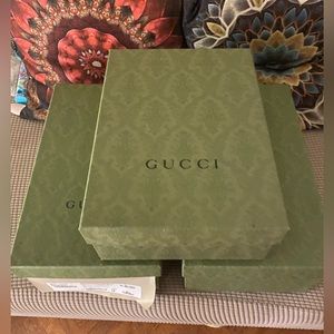 3 Gucci boxes with shopping bags
